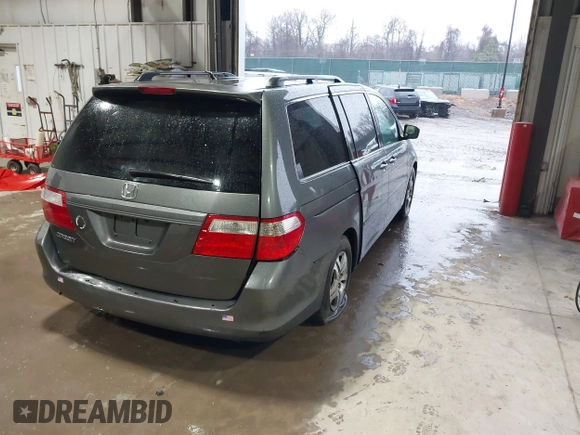 2007 Honda Odyssey EX with VIN 5FNRL38427B052619, listed as a IAAI auction lot 41727004 with 213,300 mi miles. Bid and sale history available at carsss.com. Image 4.