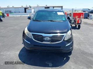 2013 Kia Sportage LX with VIN KNDPBCA25D7449584, listed as a IAAI auction lot 42489414 with 100,993 mi miles and . Bid and sale history available at DreamBid. Image 6.