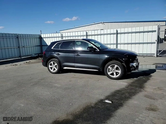 2021 Audi Q5 Premium with VIN WA1AAAFY9M2111834, listed as a Copart auction lot 46977295 with 56,388 mi miles and Salvage Title. Bid and sale history available at carsss.com. Image 12.