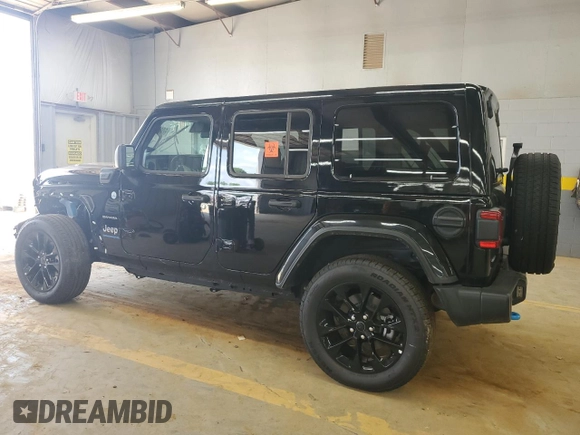 2024 Jeep Wrangler Sahara with VIN 1C4RJXP67RW292134, listed as a Copart auction lot 60993555 with 10,038 mi miles and Salvage title. Bid and sale history available at DreamBid. Image 2.