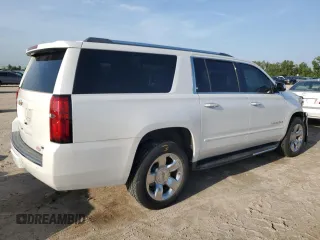 2017 Chevrolet Suburban Premier with VIN 1GNSCJKCXHR348044, listed as a Copart auction lot 55957535 with 112,131 mi miles and Salvage title. Bid and sale history available at DreamBid. Image 3.