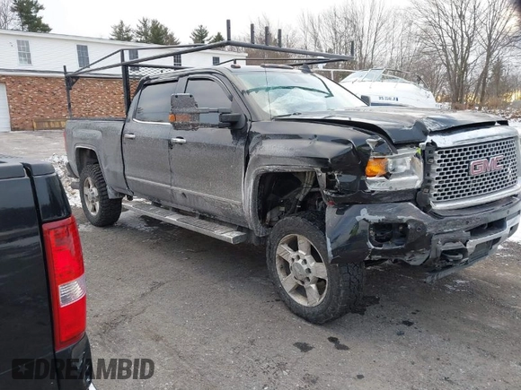2016 GMC Sierra 2500HD Denali z VIN 1GT12UE81GF128498, wystawiony jako IAAI lot #41346398 z przebiegiem 164 532 mil mil oraz . Historia ofert i sprzedaży dostępna na DreamBid. Obrazek 1.