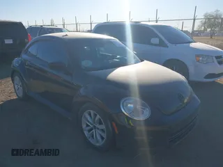 2015 Volkswagen Beetle Fleet Edition with VIN 3VWF17AT0FM649809, listed as a IAAI auction lot 41290518 with 130,598 mi miles and . Bid and sale history available at DreamBid. Image 1.