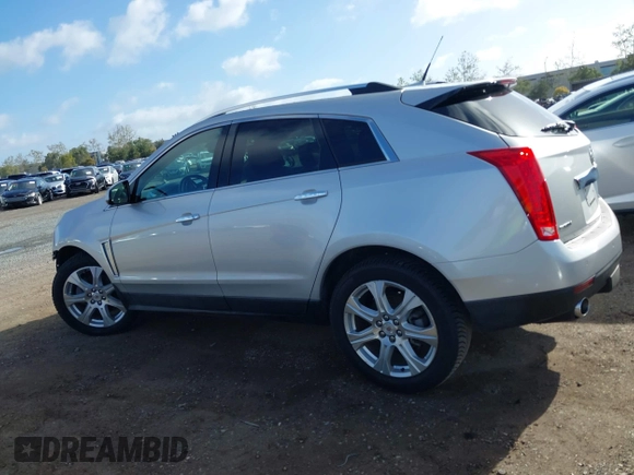 2014 Cadillac SRX Performance Collection with VIN 3GYFNCE39ES544135, listed as a IAAI auction lot 41808644 with 145,772 mi miles and . Bid and sale history available at carsss.com. Image 15.
