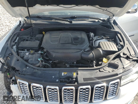 2020 Jeep Grand Cherokee Overland with VIN 1C4RJFCG4LC398526, listed as a Copart auction lot 54221205 with 122,046 mi miles and Salvage Title. Bid and sale history available at DreamBid. Image 12.