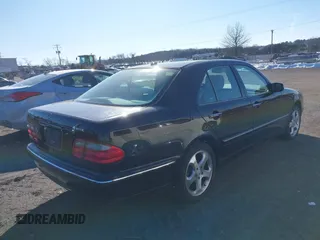 2002 Mercedes-Benz E-Class with VIN WDBJF82JX2X072422, listed as a IAAI auction lot 41390957 with 132,825 mi miles. Bid and sale history available at carsss.com. Image 4.