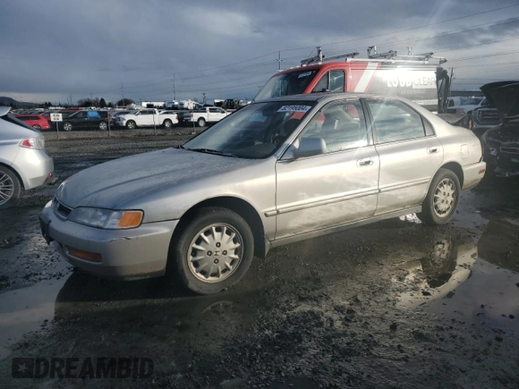 1996 Honda Accord EX with VIN 1HGCD5655TA161445, listed as a Copart auction lot 82195004 with 192,130 mi miles and Salvage Title. Bid and sale history available at DreamBid. Image 1.