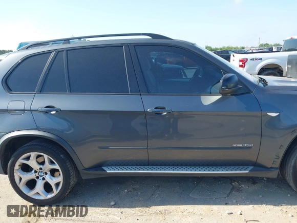 2012 BMW X5 35d with VIN 5UXZW0C51CL669957, listed as a IAAI auction lot 42230292 with 102,305 mi miles and . Bid and sale history available at DreamBid. Image 13.