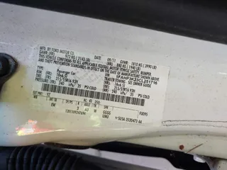 2012 Ford Focus SE with VIN 1FAHP3K23CL251716, listed as a IAAI auction lot 42036099 with 119,600 mi miles. Bid and sale history available at carsss.com. Image 9.