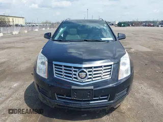 2014 Cadillac SRX Luxury Collection z VIN 3GYFNEE32ES659705, wystawiony jako IAAI lot #42148269 z przebiegiem 140 560 mil mil oraz . Historia ofert i sprzedaży dostępna na DreamBid. Obrazek 12.