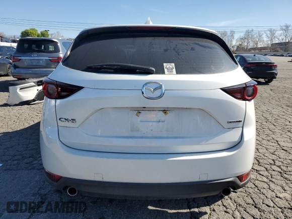 2021 Mazda CX-5 Sport with VIN JM3KFABM4M1321480, listed as a Copart auction lot 46187805 with 66,382 mi miles and Salvage Title. Bid and sale history available at carsss.com. Image 6.