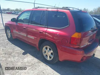 2002 GMC Envoy SLT with VIN 1GKDS13S922205147, listed as a IAAI auction lot 42041118 with 127,400 mi miles. Bid and sale history available at carsss.com. Image 3.