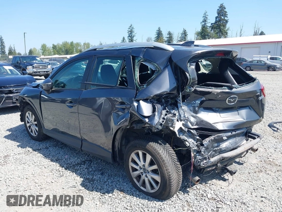 2015 Mazda CX-5 Sport z VIN JM3KE4BY5F0540612, wystawiony jako IAAI lot #42109082 z przebiegiem 83 874 mil mil oraz . Historia ofert i sprzedaży dostępna na DreamBid. Obrazek 6.