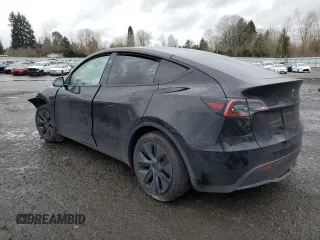 2024 Tesla Model Y Long Range with VIN 7SAYGDEE2RF131085, listed as a Copart auction lot 50171055 with Not Provided miles and Salvage Title. Bid and sale history available at DreamBid. Image 2.