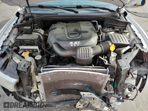 2013 Dodge Durango Citadel with VIN 1C4RDHEG6DC658958, listed as a Copart auction lot 60304945 with 209,250 mi miles and Salvage title. Bid and sale history available at DreamBid. Image 12.