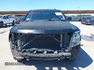 2015 Chevrolet Tahoe LS with VIN 1GNSCAKC5FR645736, listed as a IAAI auction lot 42064623 with 223,149 mi miles and . Bid and sale history available at DreamBid. Image 13.