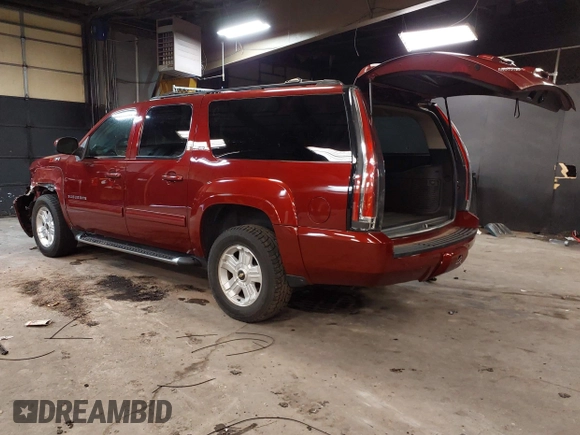 2010 Chevrolet Suburban LT z VIN 1GNUKJE32AR106197, wystawiony jako IAAI lot #42378134 z przebiegiem 106 479 mil mil oraz . Historia ofert i sprzedaży dostępna na DreamBid. Obrazek 3.