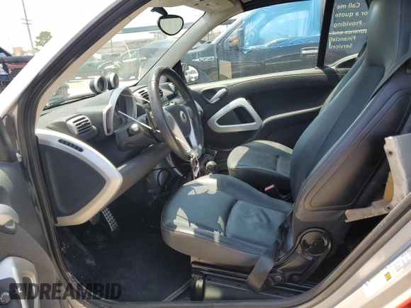 2009 Smart fortwo Passion z VIN WMEEK31X59K222243, wystawiony jako Copart lot #57106435 z przebiegiem 58 556 mil mil oraz Szkody całkowita. Historia ofert i sprzedaży dostępna na DreamBid. Obrazek 7.