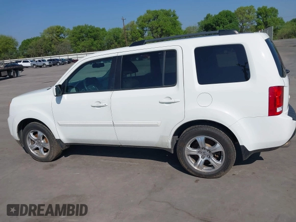2015 Honda Pilot EX-L with VIN 5FNYF4H56FB061663, listed as a IAAI auction lot 41873152 with 211,876 mi miles and . Bid and sale history available at carsss.com. Image 14.