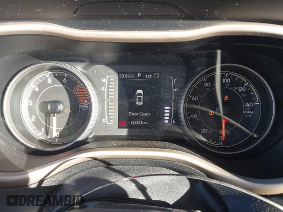 2016 Jeep Cherokee Altitude with VIN 1C4PJLCS8GW173279, listed as a IAAI auction lot 41129117 with 163,978 mi miles. Bid and sale history available at carsss.com. Image 7.