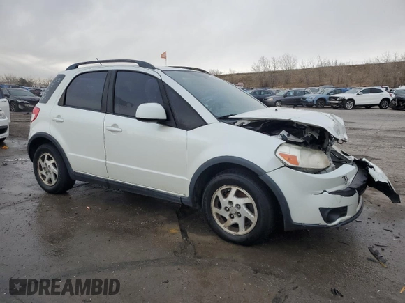 2009 Suzuki SX4 Man AWD with VIN JS2YB413296205039, listed as a Copart auction lot 83799554 with 160,910 mi miles and Salvage Title. Bid and sale history available at carsss.com. Image 4.