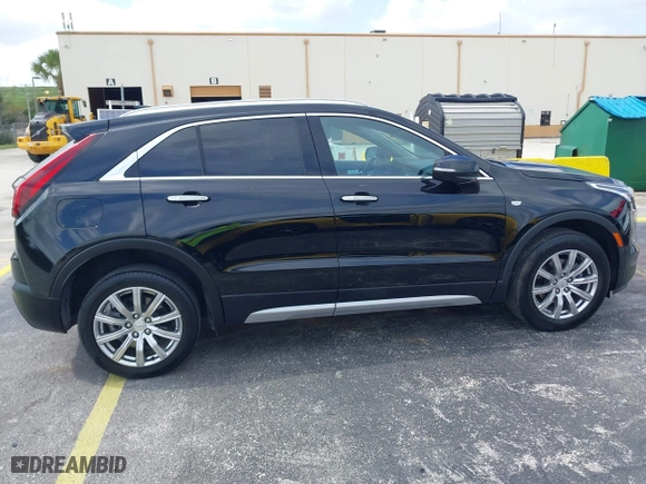 2023 Cadillac XT4 FWD Premium Luxury with VIN 1GYFZCR44PF170452, listed as a IAAI auction lot 42084960 with 22,212 mi miles. Bid and sale history available at carsss.com. Image 13.