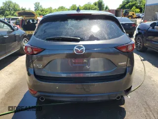 2020 Mazda CX-5 Grand Touring with VIN JM3KFBDM4L0771394, listed as a Copart auction lot 58830274 with 46,534 mi miles and Salvage Title. Bid and sale history available at carsss.com. Image 6.