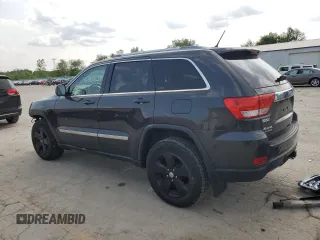 2011 Jeep Grand Cherokee Laredo with VIN 1J4RR4GG1BC610654, listed as a Copart auction lot 58828015 with 155,959 mi miles and Salvage title. Bid and sale history available at DreamBid. Image 2.