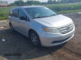2012 Honda Odyssey EX-L with VIN 5FNRL5H65CB039015, listed as a IAAI auction lot 42612886 with 216,955 mi miles and . Bid and sale history available at DreamBid. Image 1.