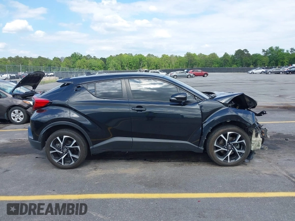 2019 Toyota C-HR XLE with VIN NMTKHMBX4KR096569, listed as a IAAI auction lot 42147017 with 111,569 mi miles and . Bid and sale history available at DreamBid. Image 13.
