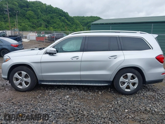 2018 Mercedes-Benz GLS 450 z VIN 4JGDF6EE1JB055629, wystawiony jako IAAI lot #42279679 z przebiegiem 61 447 mil mil oraz . Historia ofert i sprzedaży dostępna na DreamBid. Obrazek 14.