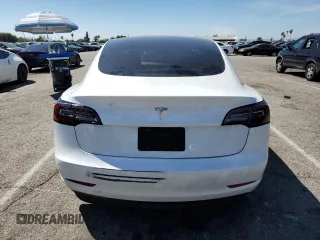 2023 Tesla Model 3 with VIN 5YJ3E1EA9PF401418, listed as a Copart auction lot 50597015 with 79,673 mi miles and Salvage Title. Bid and sale history available at DreamBid. Image 6.