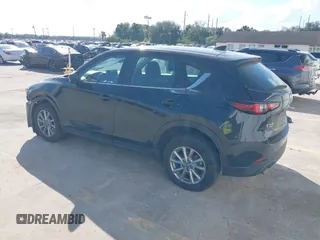 2023 Mazda CX-5 2.5 S with VIN JM3KFBAM3P0104813, listed as a IAAI auction lot 41540923 with 30,861 mi miles. Bid and sale history available at carsss.com. Image 3.