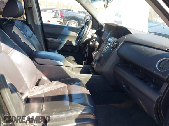 2015 Honda Pilot Touring with VIN 5FNYF3H97FB016390, listed as a IAAI auction lot 41753590 with 217,156 mi miles. Bid and sale history available at carsss.com. Image 5.