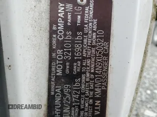 1999 Hyundai Accent z VIN KMHVD14N9XU503210, wystawiony jako Copart lot #56486325 z przebiegiem 195 501 mil mil oraz Szkody całkowita. Historia ofert i sprzedaży dostępna na DreamBid. Obrazek 12.