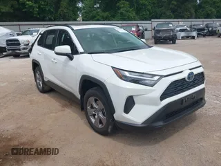2022 Toyota RAV4 Hybrid XLE with VIN JTMRWRFV3NJ055556, listed as a IAAI auction lot 42393499 with 21,646 mi miles and . Bid and sale history available at DreamBid. Image 1.