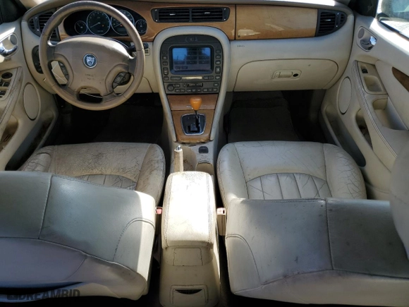 2002 Jaguar X-Type with VIN SAJEA51C12WC33477, listed as a Copart auction lot 83711124 with 165,637 mi miles and Salvage Title. Bid and sale history available at carsss.com. Image 8.