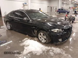2012 BMW 5 Series 528i xDrive with VIN WBAXH5C51CDW03156, listed as a IAAI auction lot 41236722 with 189,196 mi miles. Bid and sale history available at carsss.com. Image 1.