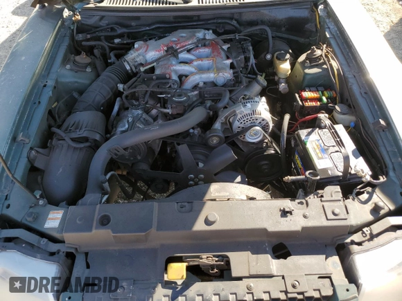 2000 Ford Mustang with VIN 1FAFP4043YF263744, listed as a Copart auction lot 46882165 with Not provided miles and Salvage title. Bid and sale history available at DreamBid. Image 11.