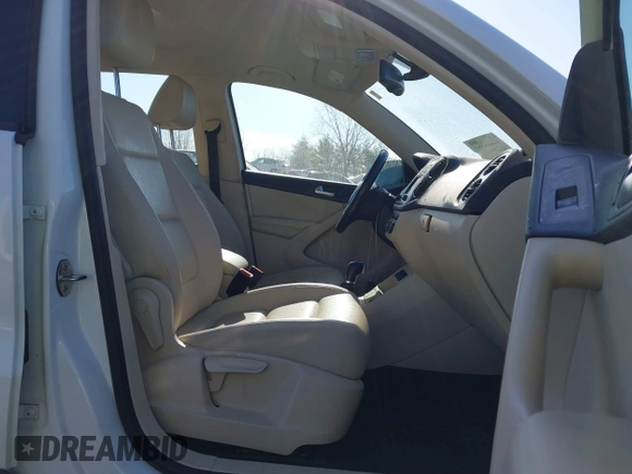 2016 Volkswagen Tiguan SE with VIN WVGBV7AX0GW018760, listed as a IAAI auction lot 41733586 with 60,743 mi miles and . Bid and sale history available at DreamBid. Image 5.