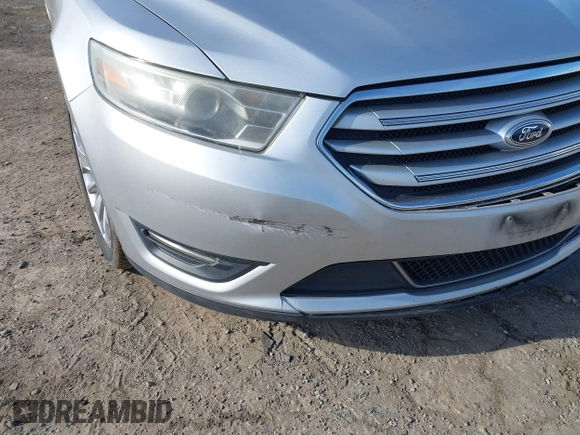 2014 Ford Taurus Limited with VIN 1FAHP2F86EG134779, listed as a IAAI auction lot 41660527 with 115,016 mi miles. Bid and sale history available at carsss.com. Image 17.