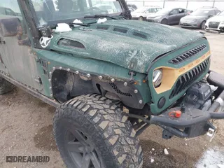 2010 Jeep Wrangler Unlimited Sport with VIN 1J4BA3H12AL230749, listed as a IAAI auction lot 41052278 with 156,217 mi miles. Bid and sale history available at carsss.com. Image 6.