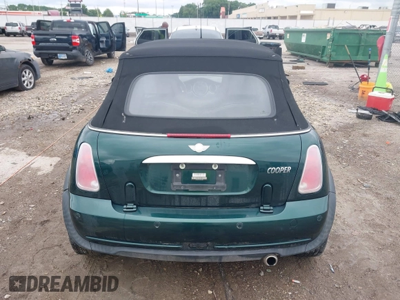 2005 MINI Convertible with VIN WMWRF33495TG11818, listed as a IAAI auction lot 42351446 with 100,033 mi miles and . Bid and sale history available at DreamBid. Image 16.