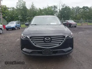 2020 Mazda CX-9 Touring with VIN JM3TCBCY5L0422262, listed as a IAAI auction lot 42456246 with 69,211 mi miles and . Bid and sale history available at DreamBid. Image 12.