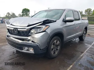 2019 Honda Ridgeline RTL-E with VIN 5FPYK3F72KB026100, listed as a IAAI auction lot 42205910 with 78,359 mi miles and . Bid and sale history available at DreamBid. Image 18.