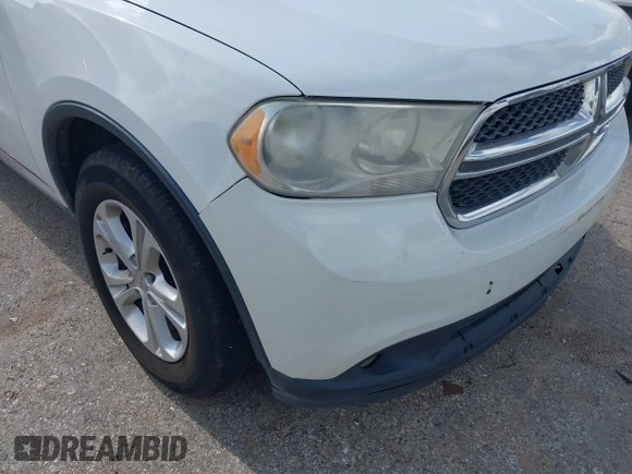 2013 Dodge Durango SXT with VIN 1C4RDHAG4DC667776, listed as a IAAI auction lot 42656299 with 204,181 mi miles and . Bid and sale history available at DreamBid. Image 17.