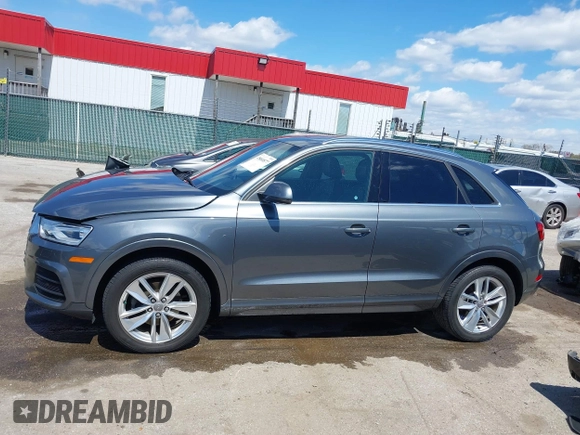 2017 Audi Q3 Premium Plus z VIN WA1JCCFS5HR003127, wystawiony jako IAAI lot #42060877 z przebiegiem 78 881 mil mil oraz . Historia ofert i sprzedaży dostępna na DreamBid. Obrazek 14.
