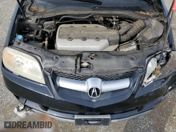 2005 Acura MDX Touring z VIN 2HNYD18985H510948, wystawiony jako Copart lot #49869175 z przebiegiem 199 297 mil mil oraz Szkoda całkowita • Salvage title. Historia ofert i sprzedaży dostępna na DreamBid. Obrazek 12.
