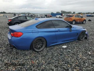 2014 BMW 4 Series 435i xDrive with VIN WBA3R5C50EK187272, listed as a Copart auction lot 56579855 with 129,873 mi miles and Salvage title. Bid and sale history available at DreamBid. Image 3.