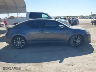 2014 Scion tC with VIN JTKJF5C74E3085237, listed as a IAAI auction lot 41788862 with 106,807 mi miles. Bid and sale history available at carsss.com. Image 14.